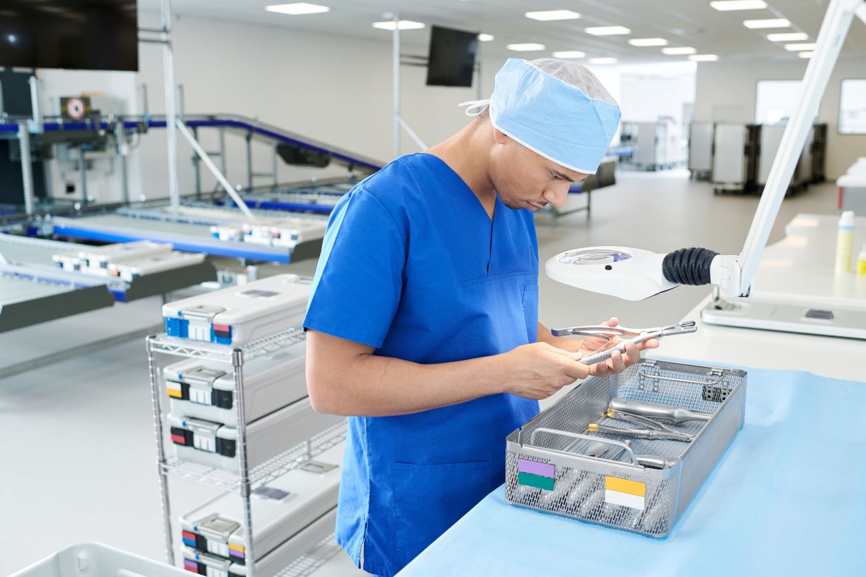 Man inspection surgical instruments in CSSD 